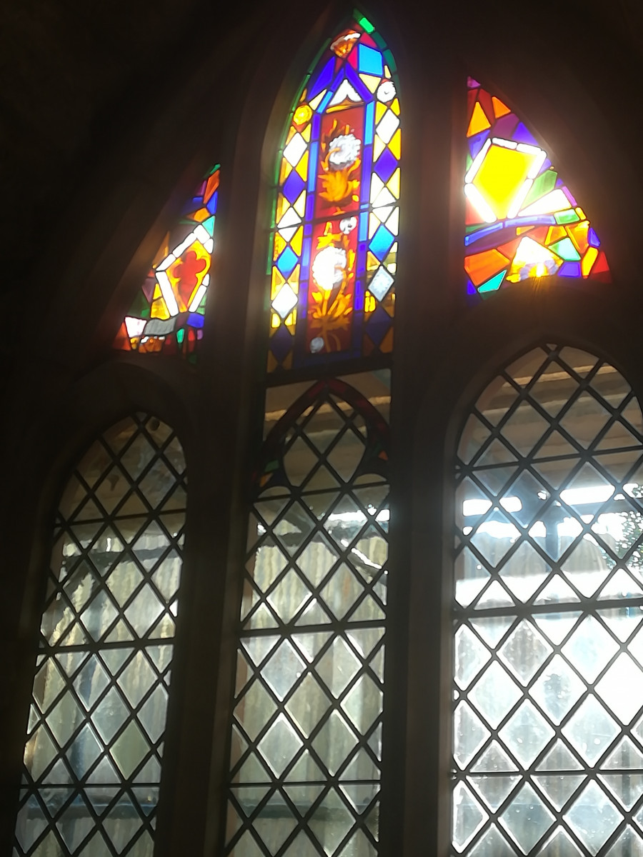 stained glass in one window in the south aisle